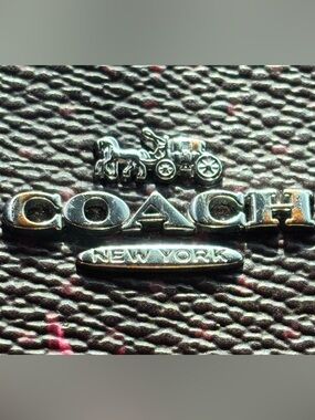 Coach pink bow zip around wallet